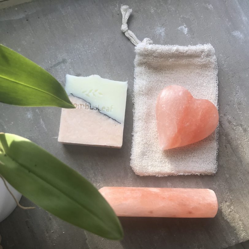 Himalayan Pink Salt Deodorant Heart on soap pouch with deodorant stick below and soap
