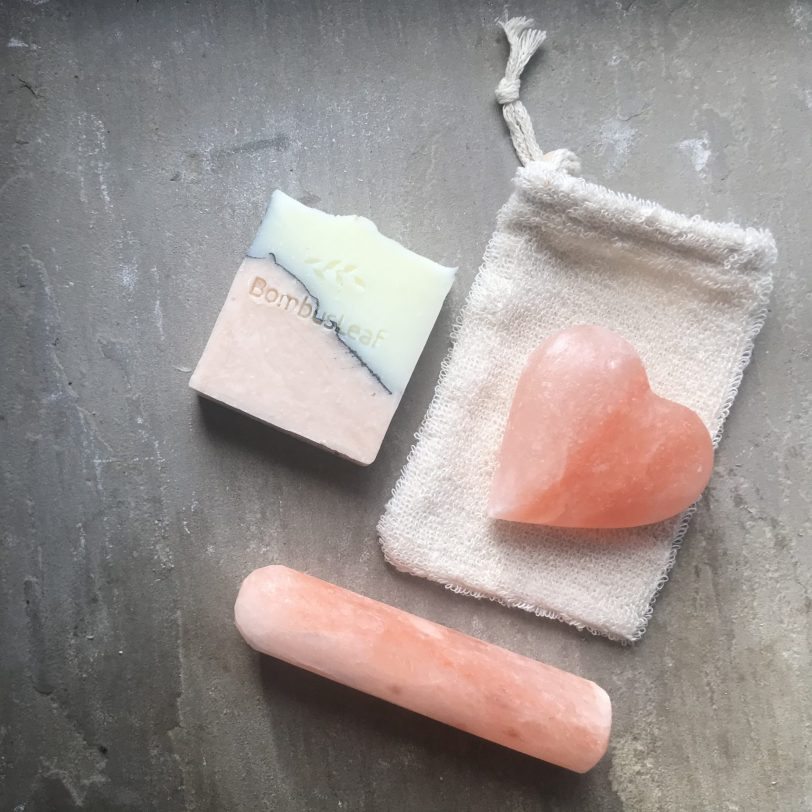 Himalayan Pink Salt Deodorant Heart on soap pouch with deodorant stick below and soap
