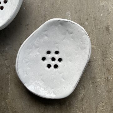 White ceramic star embossed soap dish