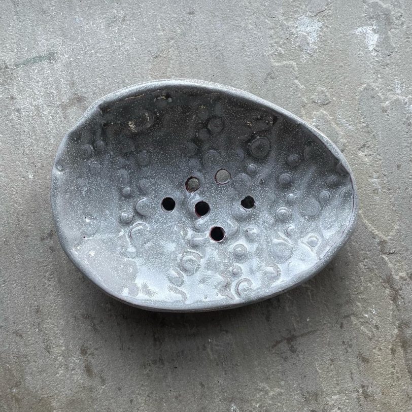 Egg shaped bubble embossed grey ceramic soap dish