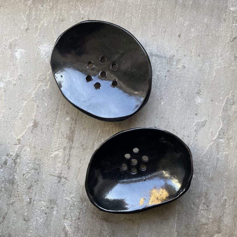 Two Black glazed ceramic soap dishes