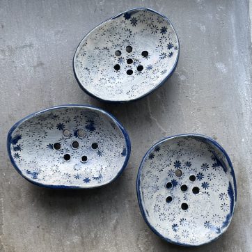 3 blue and white soap dishes with flower pattern